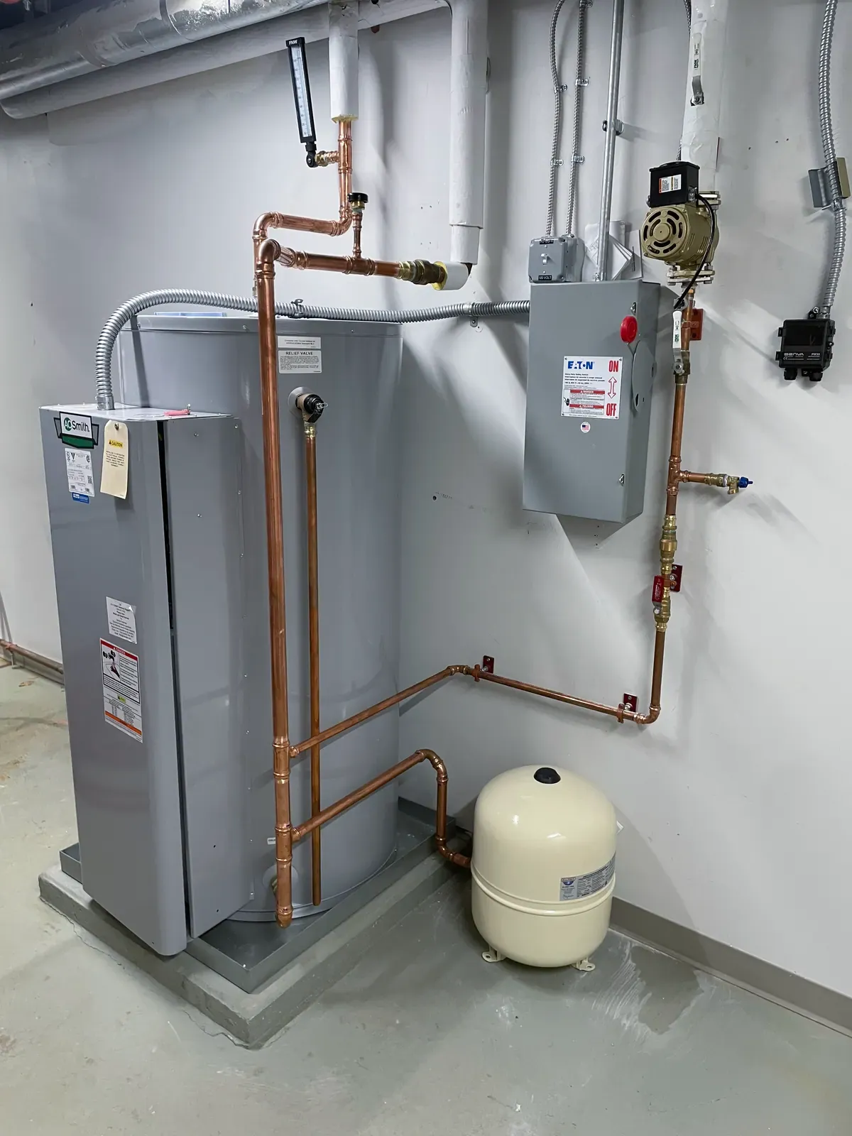 Commercial water heater replacement installed by Mallick Plumbing & Heating