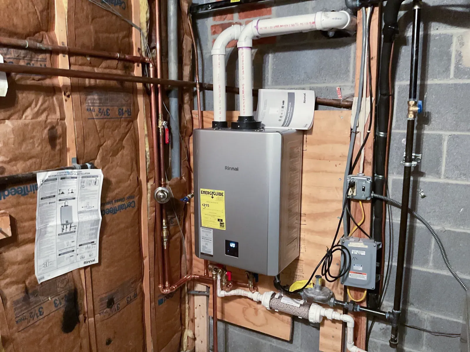 Residential Rinnai tankless water heater installation by Mallick Plumbing & Heating