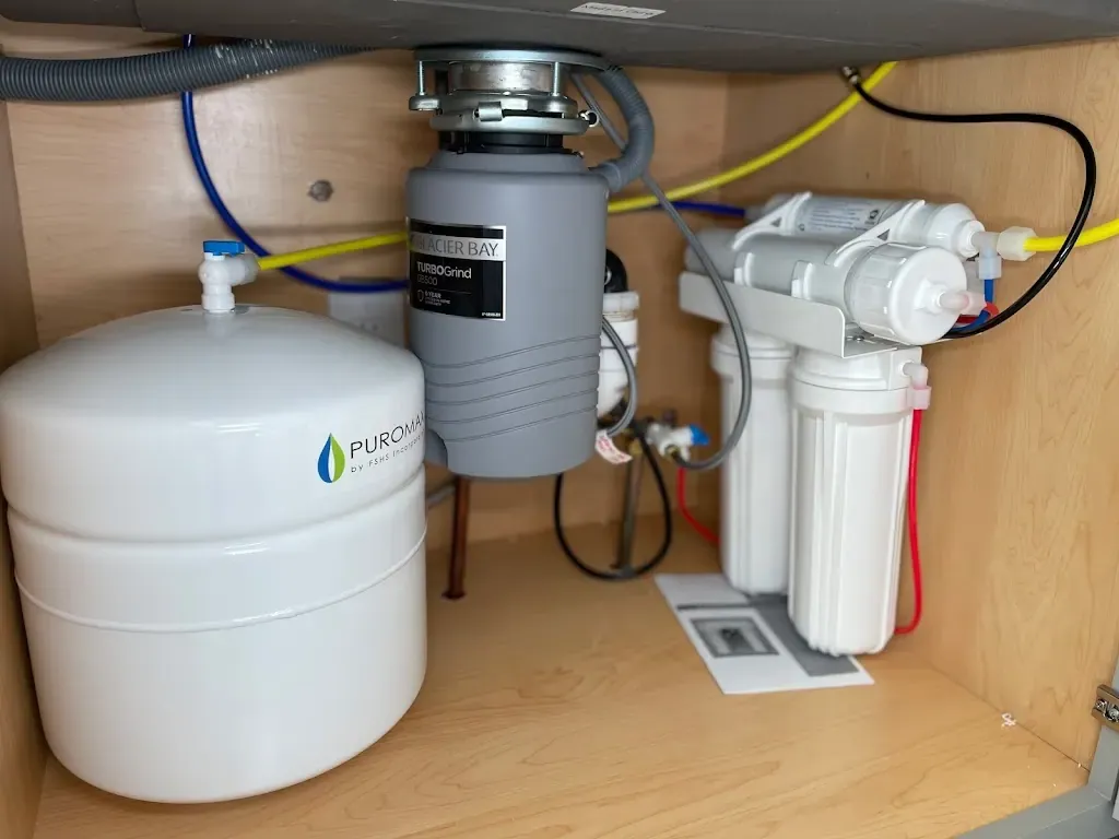 Under-sink reverse osmosis system installed by Mallick Plumbing & Heating