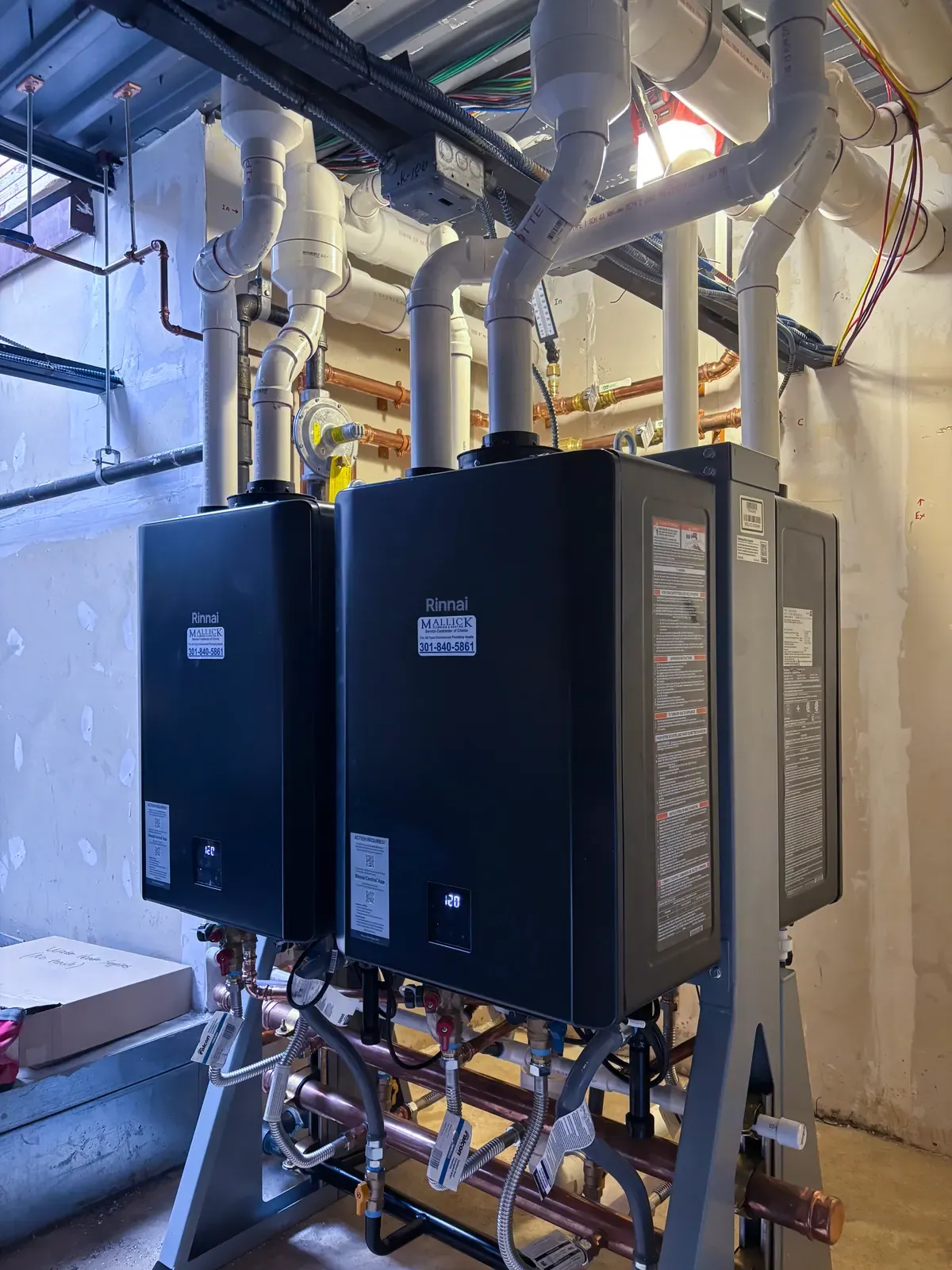 Commercial Rinnai tankless rack system installed by Mallick Plumbing & Heating
